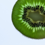 How does the kiwi, a wingless bird, survive?